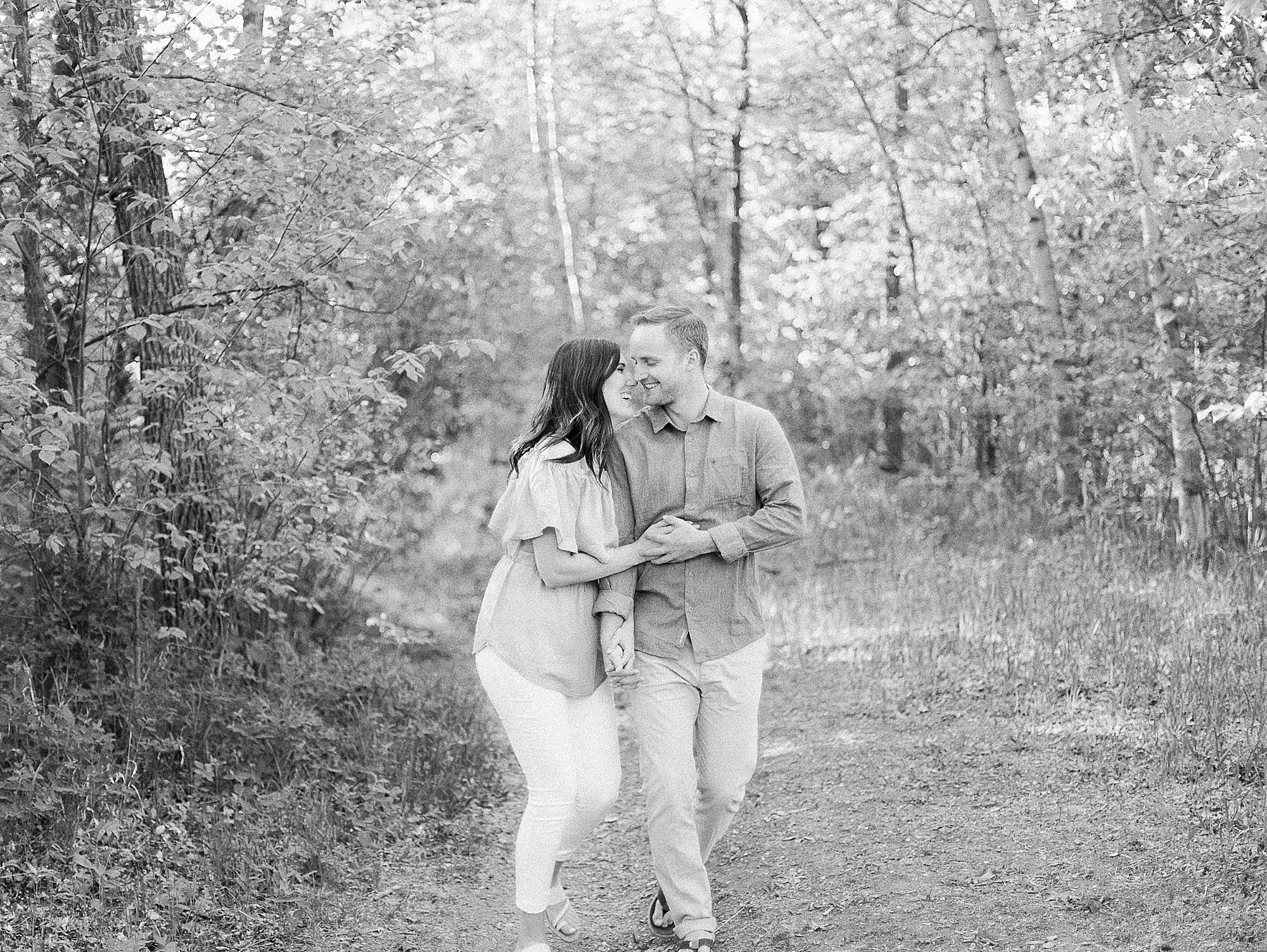 fun engagement photo ideas, cute couples pic pose ideas, black and white photography, manitoba wedding vendors
