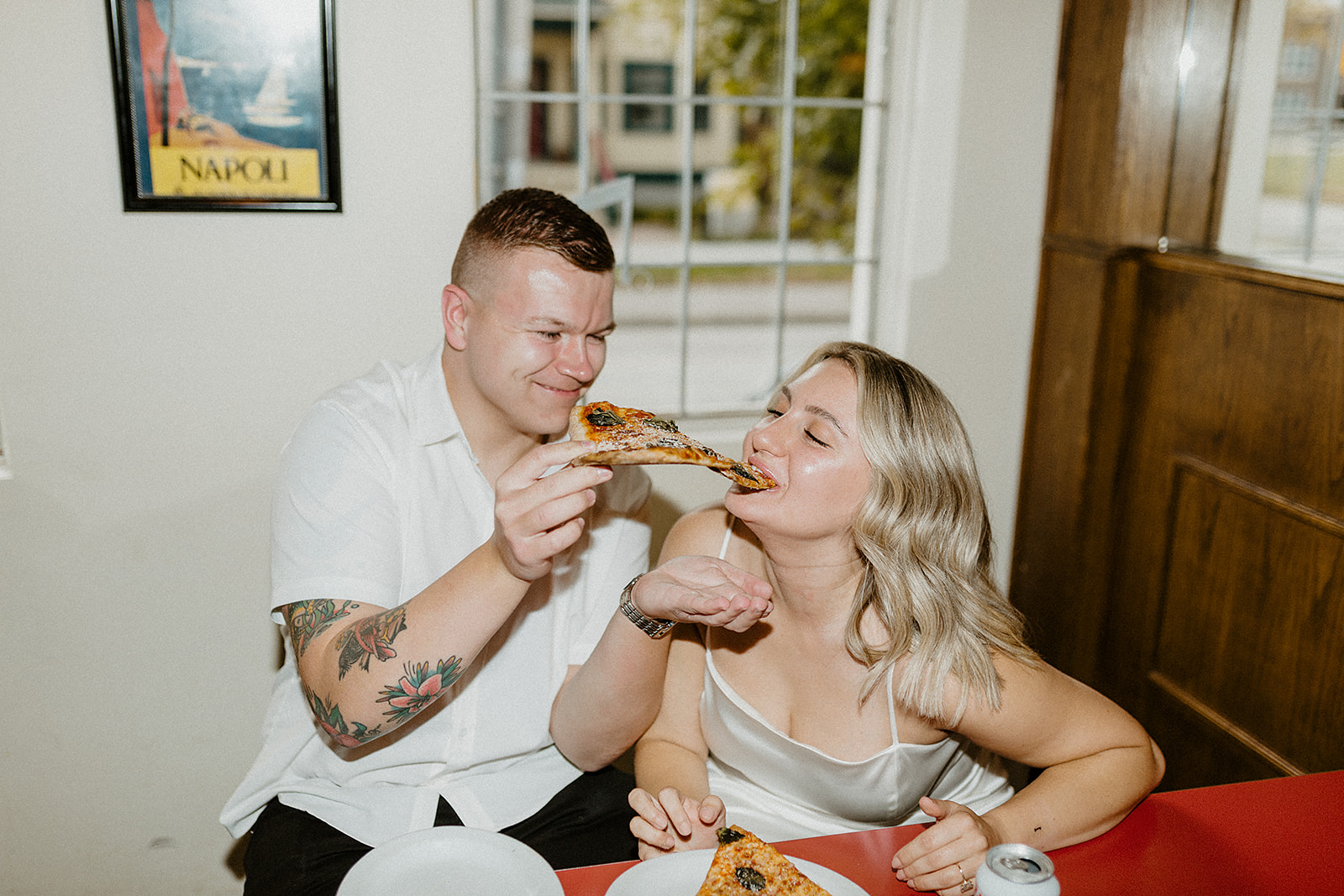 engagement photoshoot at pizza restaurant vintage bar film couples session ideas
