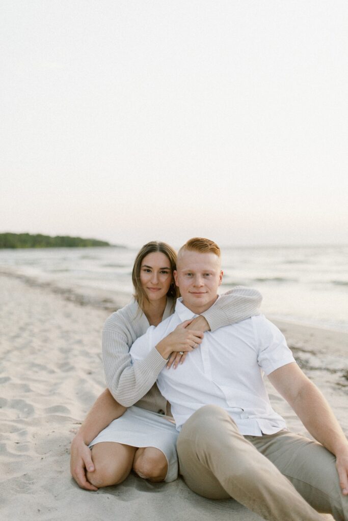 romantic manitoba engagement session of couple on the beach